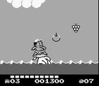 une photo d'Ã©cran de Adventure Island 2 - Aliens in Paradise sur Nintendo Game Boy